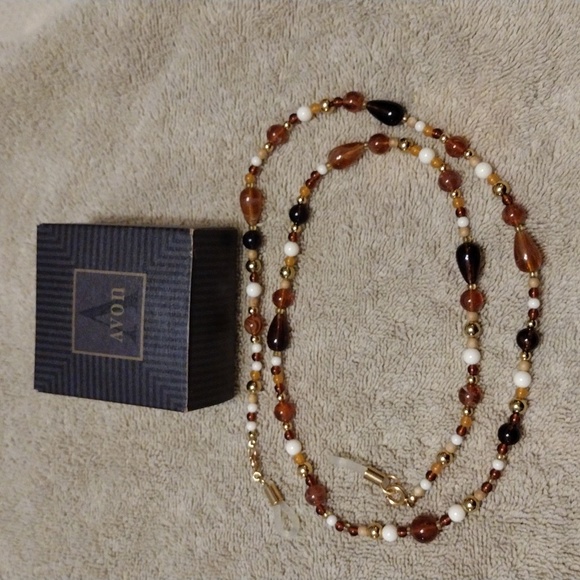 Avon Jewelry - Avon, Vintage 1995, charming And Chic Optical Necklace in tortoise.